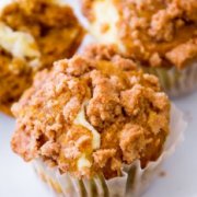 Pumpkin muffins filled with cream cheese filling and topped with sweet cinnamon brown sugar streusel!