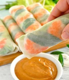 Restaurant quality peanut dipping sauce and 2 secret tips to make rolling these up a breeze! #appetizer #summer #healthy #fresh